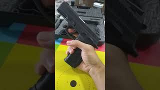 MOSTRANDO A PISTOLA TAURUS TH9 DE PERTO SHORTS [upl. by Ross]