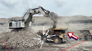 Liebherr 9350 loading komatsu 785 amp caterpillar dumper 777 [upl. by Ardnaek]