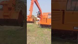 Truckmounted excavator Fourwheel drive agricultural vehicle Tipper dump truck Excavator One ma [upl. by Suirtemid]