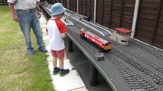 Simons Trains visits Peter Spoerers White Horse Railway  gauge 1 live steam in the garden [upl. by Ailhad223]