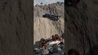 Heavy wrecker pulls too hard and falls off a cliff beamngtruckcrashes beamngdrive towtruck [upl. by Roselane]