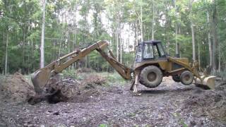 Case 580C Backhoe  Digging out three big stumps  Part 1 HD [upl. by Weissman]