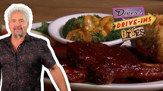 Guy Fieri Eats Lemonade Pork He Calls quotFlavor Cityquot 🤤  Diners DriveIns and Dives  Food Network [upl. by Arelus]