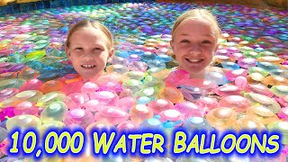 Filling Our Pool With 10000 Water Balloons [upl. by Bohrer]