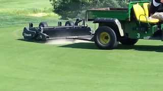 Golf Course greens aeration  brushing in the sand [upl. by Ennovi593]