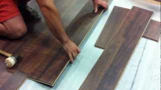 How to install a SwiftLock laminate flooring in a commercial area [upl. by Acissey539]