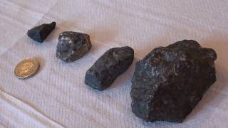 Black magnetic rocks collected at Bramfield testing with a rareearth magnet [upl. by Anayra]