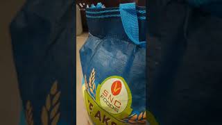 How to open Rice Bag in 30 seconds  Easy Method to open rice bag YouTube Short video [upl. by Janek]