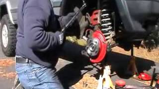 Jeep Cherokee Front Wheel Bearing Replacement  Part 2 of 3 [upl. by Enomis]