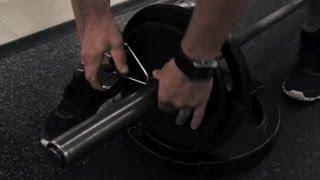 How to Put Weights on a Barbell for Deadlifts  LIVESTRONG Fitness amp Exercise Tips [upl. by Nelyak]