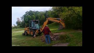 Removing a rock from under a stump [upl. by Aleck]