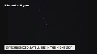 Synchronized satellites Explaining the straight line of lights in the night sky [upl. by Ellwood70]