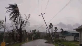 Latest typhoon to lash Philippines whips towering tidal surges sends hundreds of thousands fleeing [upl. by Ahtamas]