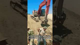 Angle slope rock wall installation process [upl. by Marder]