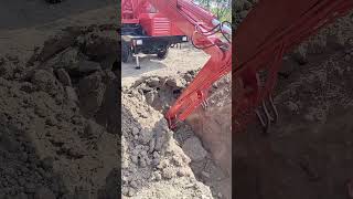 Excavator digging with vehicle fourwheel drive agricultural vehicle multipurpose machine s [upl. by Lsil626]