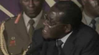 Zimbabwe Mugabe Agrees To Share Power [upl. by Yodlem]