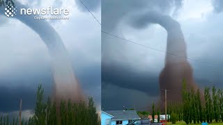 Extraordinary Landspout Tornado Footage Captured In Alberta  Newsflare [upl. by Eendys]