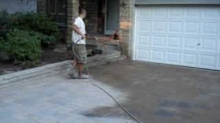 Polymeric sand installation for interlock stone driveway costruction [upl. by Nwahsat]