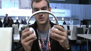 Jabra Revo in White Unboxing MWC 2013 [upl. by Ilojna96]