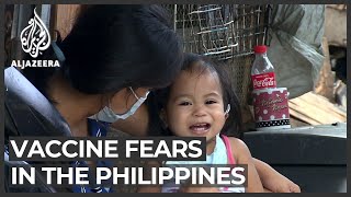 Filipinos sceptical about COVID19 vaccine after dengue probe [upl. by Htebazile808]