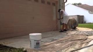 How to use an airless paint sprayer to seal and paint a garage door soffits gutters and stucco [upl. by Aninaj486]