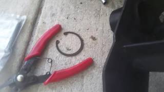 How to regrease the rear wheel bearings on a 150cc scooter [upl. by Cohl268]