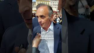 Eric Zemmour frappe une femme qui vient de lui jeter un œuf sur un marché en Corse [upl. by Eelyam]