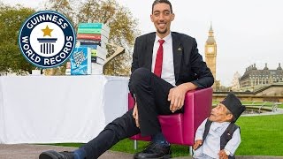 Tallest and shortest men meet for the first time  Guinness World Records Day 2014 [upl. by Nonnair741]