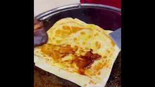 Eggfilled pancake（鸡蛋灌饼）is a popular delicacy in China [upl. by Xirtaeb]