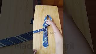 How to tie a tie on table  The quickest way to tie a necktie  Easy steps to tie a tie 10seconds [upl. by Rebma]