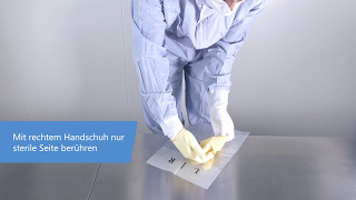 Sterile Handschuhe in einem Reinraum anziehen [upl. by Sidonie]