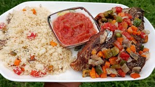 AkyekeAttiekeCouscous with Fried Tilapia amp Vegetable Sauce [upl. by Aehtrod]