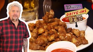 Guy Fieri Eats Chicken GIZZARDS in Michigan  Diners DriveIns and Dives  Food Network [upl. by Tutt]