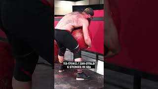 Strongman smashes huge stone run [upl. by Ahsinyt]