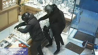 Dramatic smashandgrab robbery at west London jewellers is caught on CCTV [upl. by Hathcock]