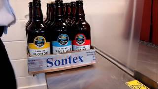 Sontex Ecopac 500 sleeve wrapper shrinkwrap machine for bottles and cans [upl. by Llyrpa116]