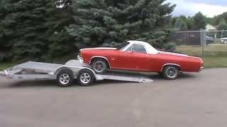 Aluma 8218 Tilt Tandem Axle Utility Trailer Loading El Camino [upl. by Lapointe]