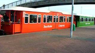 Langeoog Inselbahn vom Hafen Abfahrt in den Ort [upl. by Fotinas89]