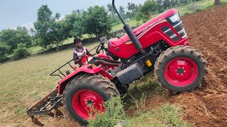 Mahindra yuvo tech plus 585 4wd tractor goes to 9 point cultivator performance in soil farmland [upl. by Hasile]