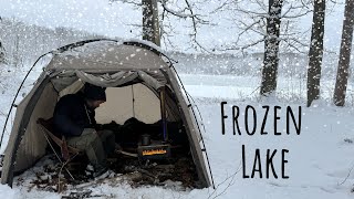 HOT TENT Camping in a SNOW STORM by a Frozen Lake [upl. by Lonna]