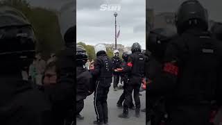 French police simultaneously lift Just Stop Oil eco protesters to shouts of bravo [upl. by Lynden]