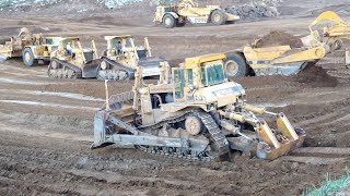 CAT D10N Dozers and 651E scrapers at work  Massive earth moving [upl. by Bounds]