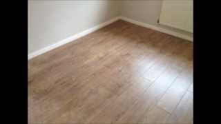 Laminate Flooring by Perfection Flooring Kolberg Oak 12mm Laminate Flooring Installation [upl. by Nnahtur]