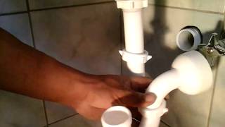 Instalar un sifón para lavamanos  Install a sink siphon [upl. by Elrak974]