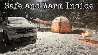 SNOW STORM CAMPING in an INFLATABLE TENT w Heavy Snow [upl. by Bluhm]