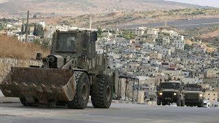 Israeli army vehicles deploy in West Bank camp after deadly raid  AFP [upl. by Wadlinger785]