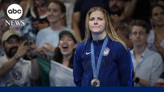 Olympics US swimmer Katharine Berkoff wins bronze 32 years after her dad [upl. by Htedirem]