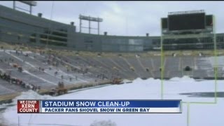 Packer fans clear snow at Lambeau Field [upl. by Lydell696]