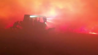 Buscan cuerpos en tierra arrasada por incendios en California [upl. by Neellek471]