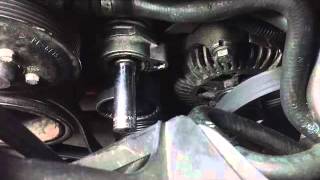 BMW Drive Belt Tensioner Pulley Replacement Part 2 [upl. by Thadeus]